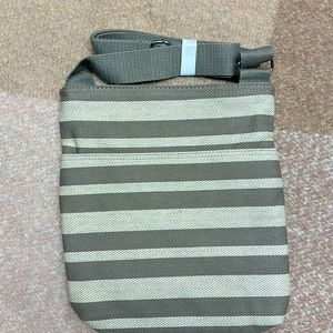 Thirty-one organizing shoulder bag/ look at the matching items in my closet :)